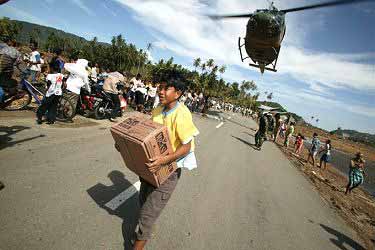 Indonesian child helping