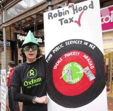 Oxfam staff raising awareness of the Robin Hood tax in Wellington