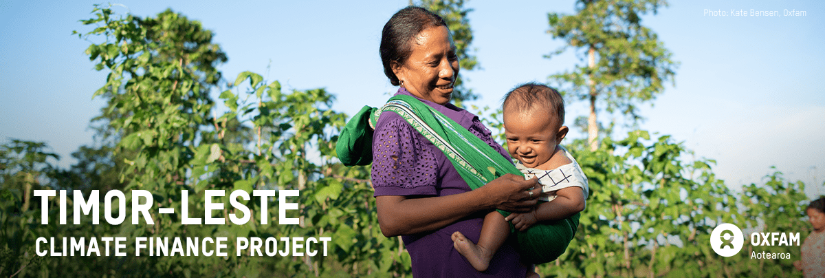 Image of a mother and her young child with text 'Timor-Leste Climate Finance Project'