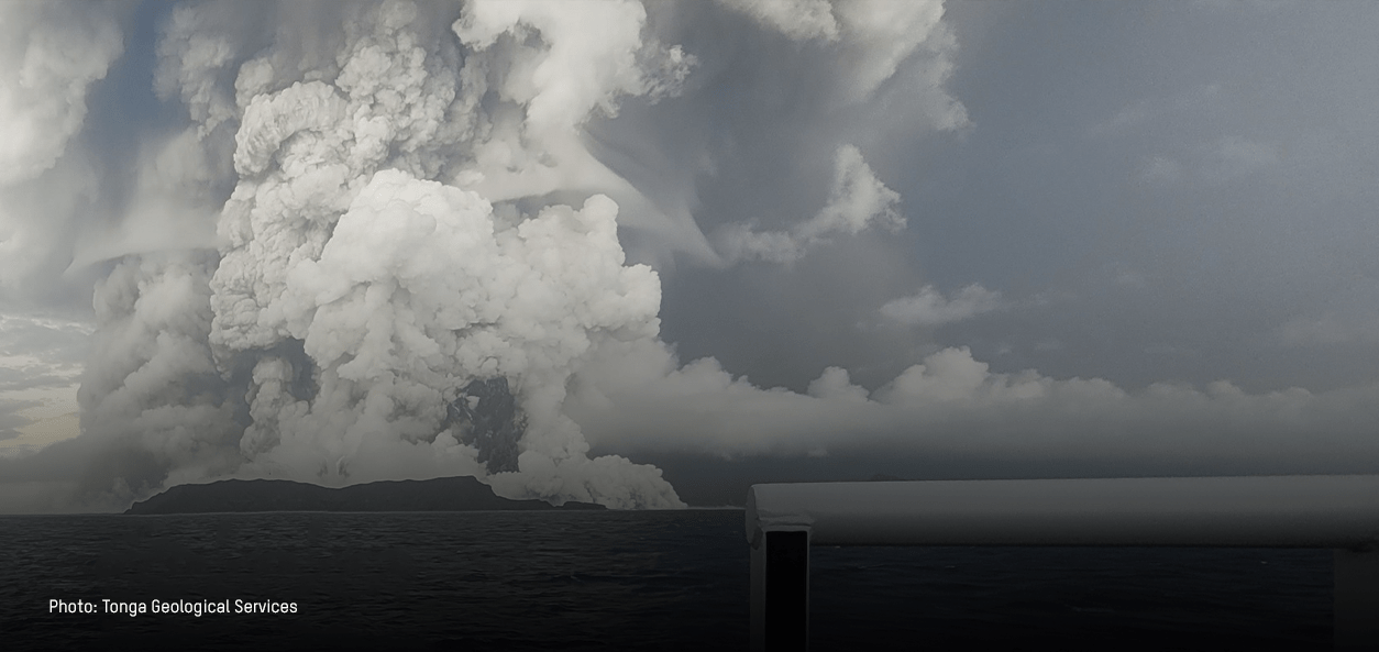 Image of a large volcanic eruption at sea