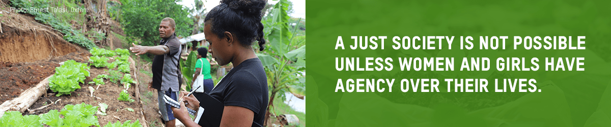 Image of a girl taking notes over a vege patch with text 'A just society is not possible unless women and girls have agency over their lives.'