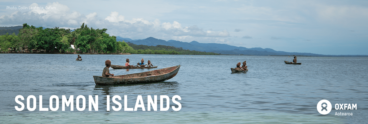 A boat in the Ocean, text Solomon Islands