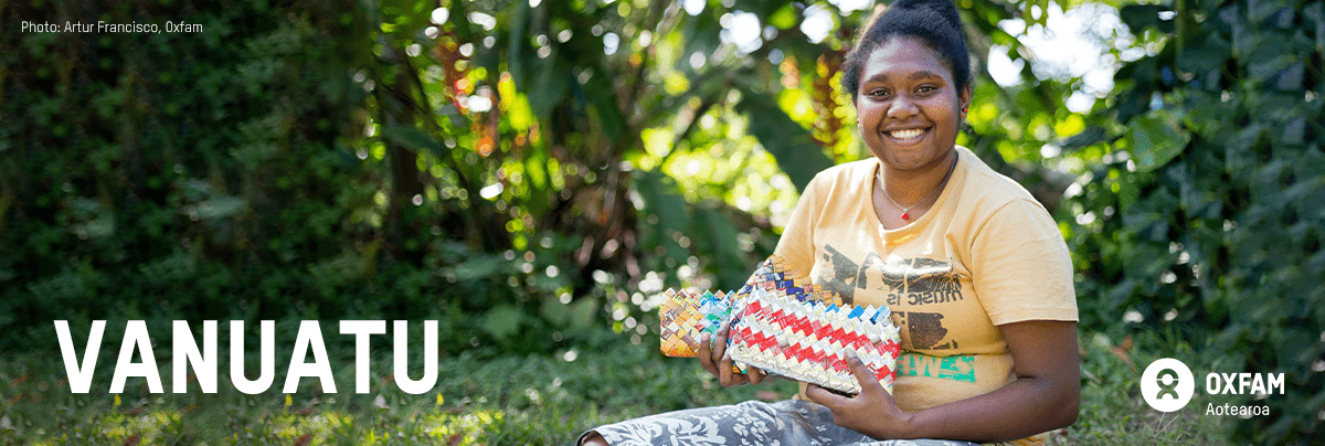 Florian holds her woven bags, with text 'Vanuatu'