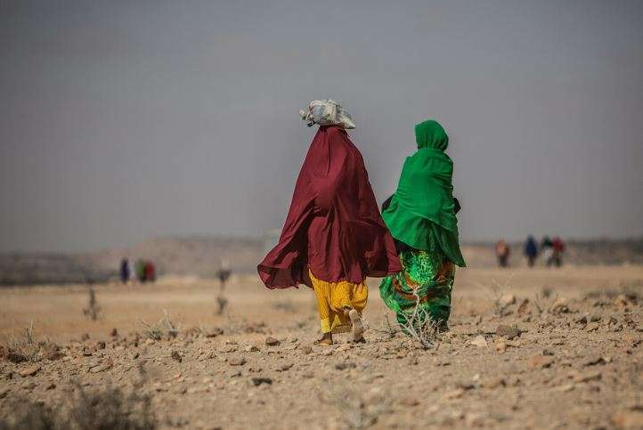 Two women walk together