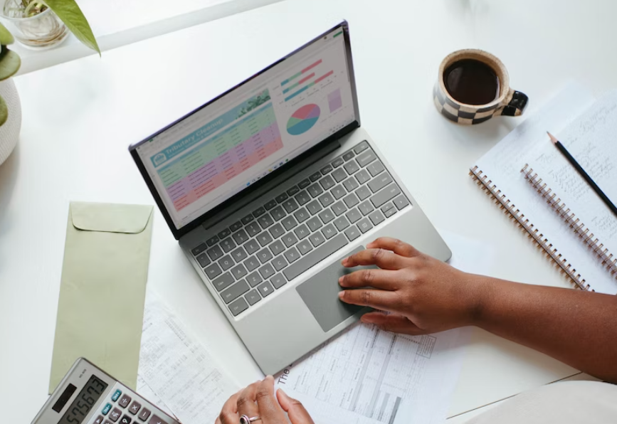 A woman working on a laptop