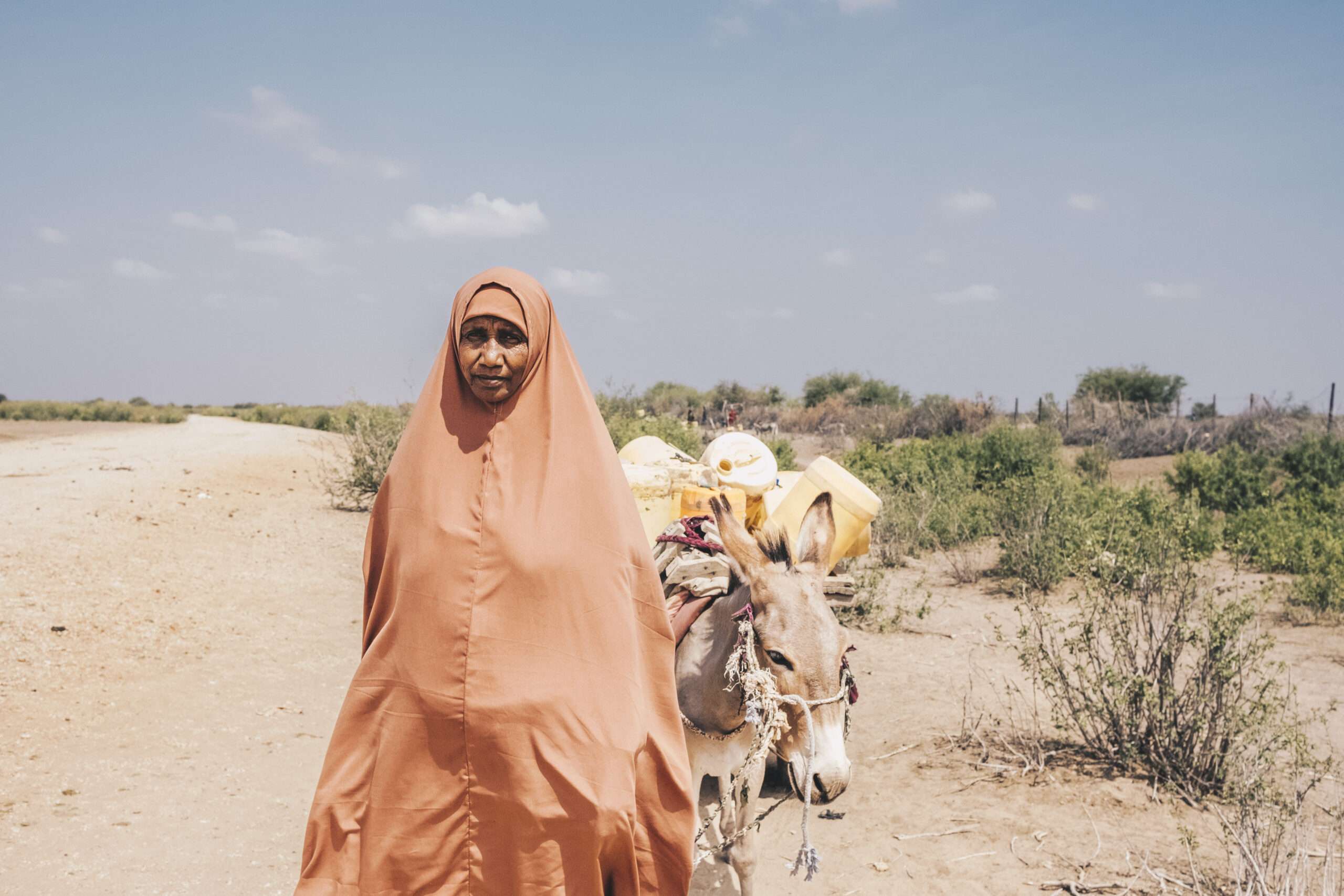 Woman returns home after fetching water