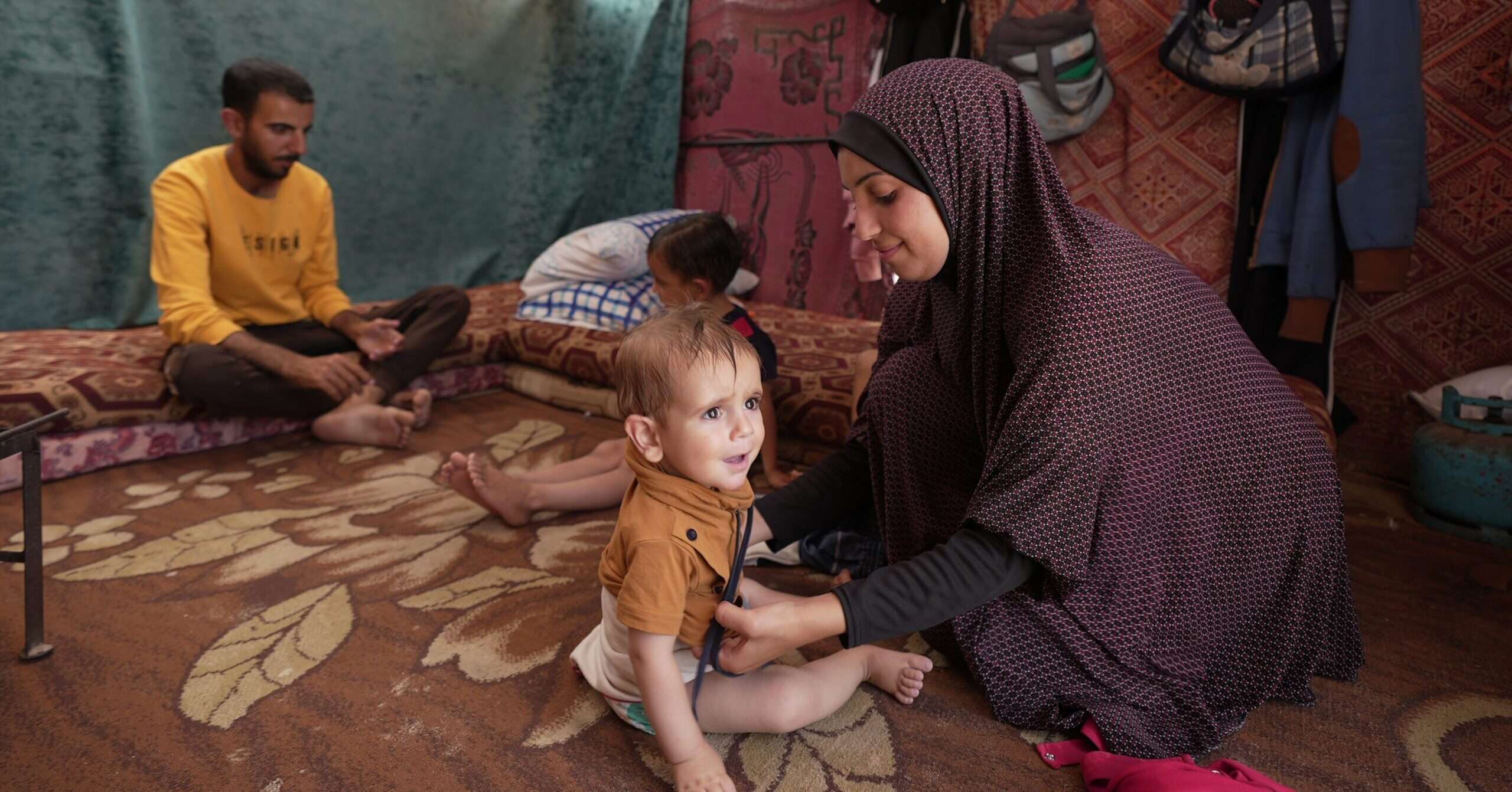 mother and child in Al Mawasi, Palestine