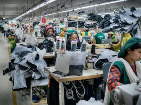 Textile workers are working inside a garment factory in Savar.