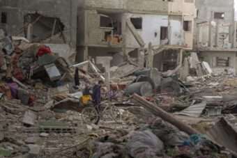 Man in ruins in Gaza